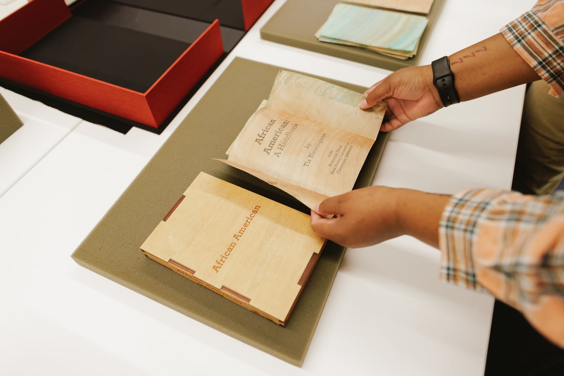 Student in a library workshop using archival material
